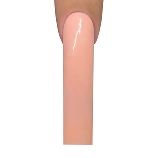 a top view of a finger model displaying the #5 everyday nude application on a custom nail tip 