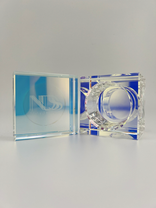 top view of dappen dish with lid and dish angled away side by side displaying clarity and different blue reflections